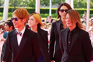 Glay at the 2014 MTV Video Music Awards Japan. From left to right: Jiro, Hisashi, Takuro, Teru.