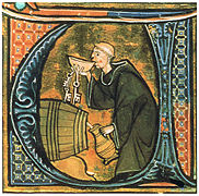 Un monje celador catando vino de un barril mientras llena una jarra. De Li Livres dou Santé por Aldobrandino de Siena (Francia, fines del Siglo XIII).