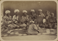 Troop of Tajik or Uzbek musicians from Russian Turkestan. Musician on far left has pilili-like instrument.