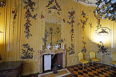 Rococo - fourth guest room, so-called Voltaire Room, Sanssouci, Potsdam, Germany, designed by Georg Wenzeslaus von Knobelsdorff, with decoration by Johann Michael the Elder and Johann Christian Hoppenhaupt the Younger, 1752-1753[40]