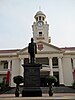 The clock tower of Hwa Chong Institution and the statue of its founder