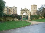 Gateway, attached garden walls and coachhouse to south of main front of Chastleton House