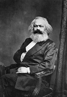 A portrait picture of Karl Marx.