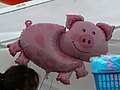 Pig-related souvenirs and balloons