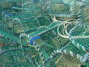 Large pile of lobster pots, Youghal, Ireland