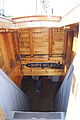 The entrance to the hold of Sherman Zwicker, a wooden auxiliary schooner moored at the Maine Maritime Museum in Bath, Maine, USA