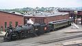 Canadian National #3254 steam engine waiting to pull two passenger cars on a tour of the Steamtown NHS yard (plus two other photos there)