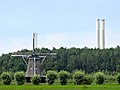 Wind mill Windesheimer molen with a factory in the background