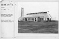 Early 1900s industrial gas processing plant with natural ventilation accompanied with a ridge ventilator