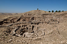 Photograph of the main excavation area of Göbekli Tepe, showing the ruins of several prehistoric structures.