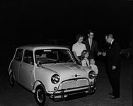 The first Morris Mini-Minor sold in Texas being delivered to a family in Arlington, Texas, in 1959