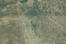 Aerial view of the Etaka River with the Olushandja Dam on the north side.