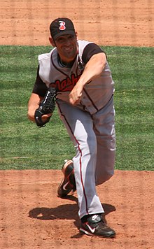 A baseball player in gray