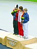 Wang (centre) at the medal presentation for the 500 metres