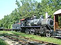 ES&NA No. 201 is displayed on a siding in the railyard; she was formerly the iron workhorse of the excursion trains. Depot of the Eureka Springs & North Arkansas Railway, originally built in 1912–13 to replace a wooden depot built in the 1880s.