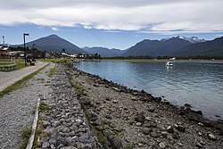 Seaside road of Hornopirén and Hornopirén Volcano in the background.