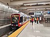 A northbound test train at Union Square/Market Street station during a public viewing event, four days before revenue service began in November 2022