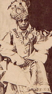 Sikandar Begum, wearing ceremonial dress and a crown