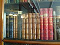 The collected works of Pushkin (in brown leather bindings) in Tchaikovsky's bookcase. They were the source of his operas Eugene Onegin and The Queen of Spades.