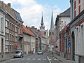 Tielt, tower from Huis Denys and church (de Sint Pieterskerk) in the stret (de Ieperstraat)