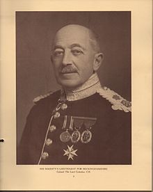 Cottesloe in older age; balding, wearing military dress uniform and medals.