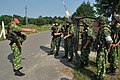 White KMLK wearing Ukrainian officer briefing white KZS wearing Ukrainian troops during exercise Rapid Trident 2013