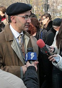 Artashes Emin being interviewed during the dedication ceremony of the statue of Gevorg Emin at Lovers' Park on December 11, 2010.