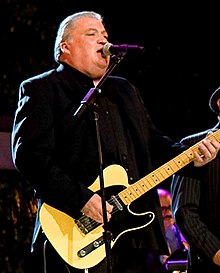 Hidalgo performing with Los Lobos on the South Lawn of the White House, October 13, 2009