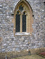 A flint church – the Parish Church of Saint Thomas, in Cricket Saint Thomas, Somerset, England. The height of the very neatly knapped flints varies between 3 and 5 inches (7.6 and 12.7 cm).