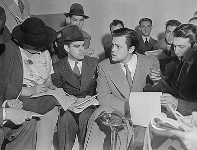 Press conference after "The War of the Worlds" broadcast, by Acme News Photos