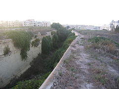 View along the forward ditch towards the left hand caponier in the distance.