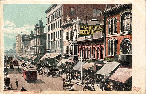 Looking south on Spring between 2nd and 3rd, c.1905. In the background at center: towers of the Hotel Ramona. To its right, the Douglas Building, Woollacott Block, Anheuser restaurant, Hamilton Bros. shoe store block, and portion of the Turnverein Hall