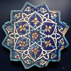 Tile from local 15th century Madrasa-i Ghiyathiyya, presently in the V&A museum, London