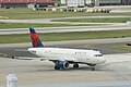 A Delta A319 pushing back at BHM
