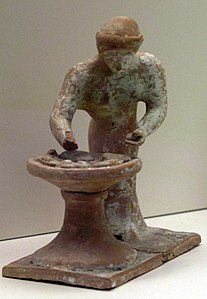 Estatueta de padeira, Tânagra, c. 500-475 a.C.