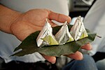 Paan (betel leaves) being served with silver foil at Sarnath near Varanasi, India