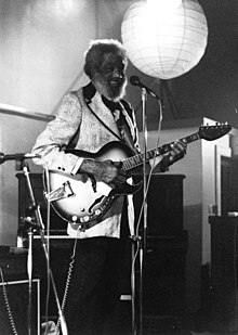 Gaillard with guitar at the Queen's Hall, Edinburgh, Scotland, 1982