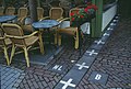 Border between the Netherlands and Belgium next to a street café in Baarle Nassau and Baarle Hertog. Some European borders originate from former land ownership boundaries.