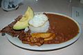 Colombia's national dish with frijoles rojos (red beans), served with rice and other accompaniments