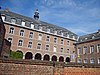 Les bâtiments anciennement occupés par l'Athénée royal, devenu Musée du Carnaval et du Masque (anciennement Collège des Augustins)