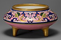 Oriental bowl, 1871, Christopher Dresser, with motifs from ancient Chinese ritual bronzes, in a "cloisonné ware" style.