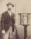 Mackintosh with his gun and a trophy