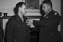 Photo of Fidler receiving the Legion of Merit from General Groves in 1945
