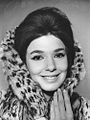 Graciela Borges, Argentine fashion icon of the 1960s, wearing a fur coat, bouffant hair and winged eye liner.