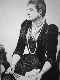 Queen of Italy, Margherita of Savoy, owned one of the most famous collections of natural pearls. She is wearing a multi-strand choker and a rope of pearls