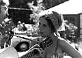 Singer Maria Muldaur in 1968, wearing a gypsy-style kerchief and hoop earrings.