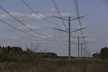 The high-voltage transmission line Kassø-Tjele at the road between Ejstrupholm and Brande