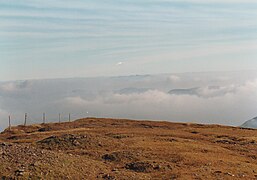 Looking across from Mount Brandon towards Carrauntoohil in the clouds