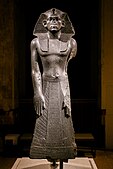 A damaged portrait sculpture of Amenemhat III in the Ägyptisches Museum Berlin, Berlin