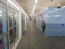 Emplacement d'un futur escalier vers la ligne 15 sur le quai central.